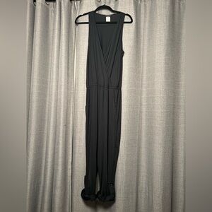 Carmen Marc Valvo Swim Black Sleeveless V-Neck Jumpsuit roll tab legs